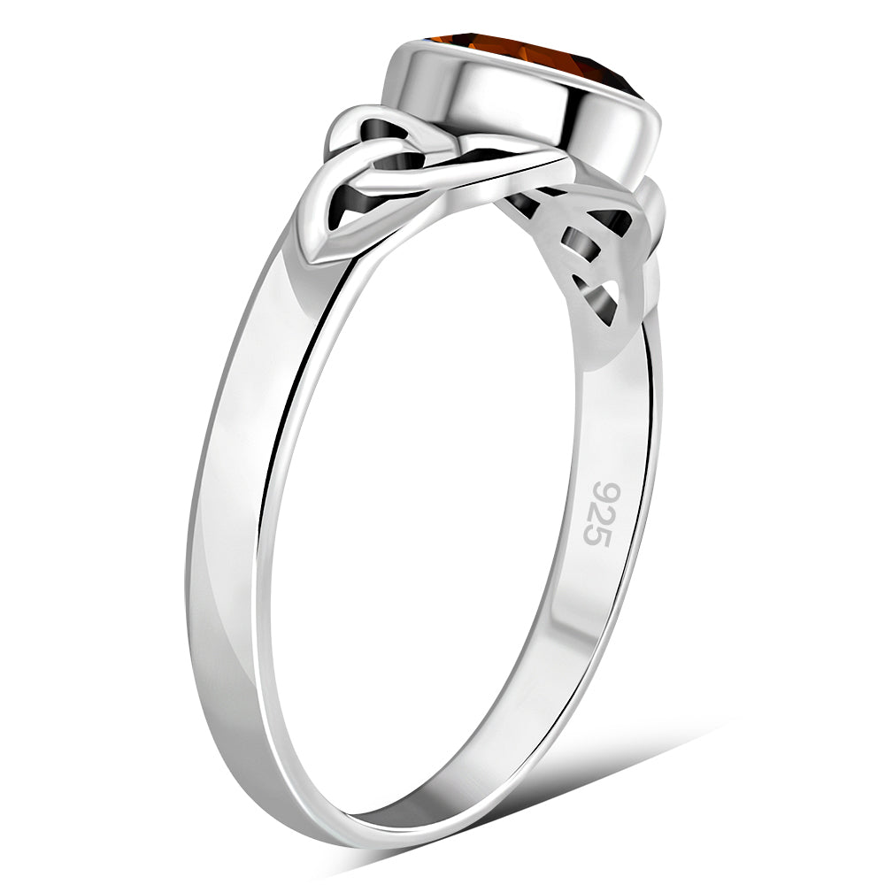 Silver Celtic Ring set w/ Garnet Stone