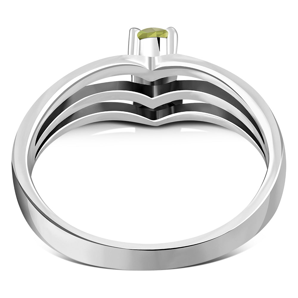 Silver Ring set w/ Faceted Peridot Stone